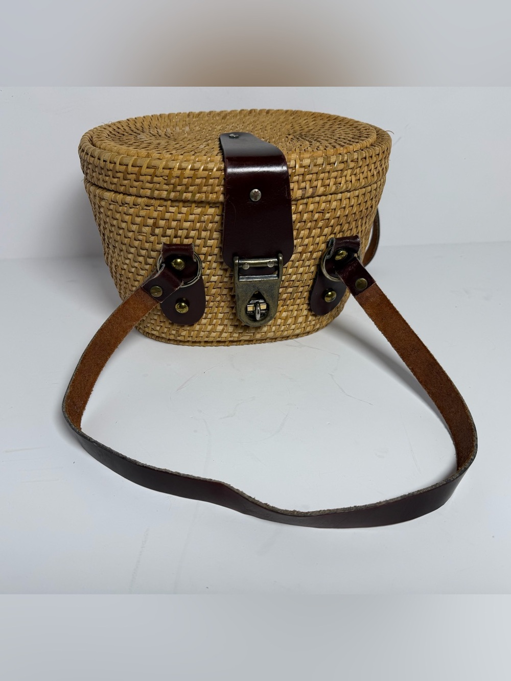 Woven Straw Round Crossbody Bag with Brown Leather Trim